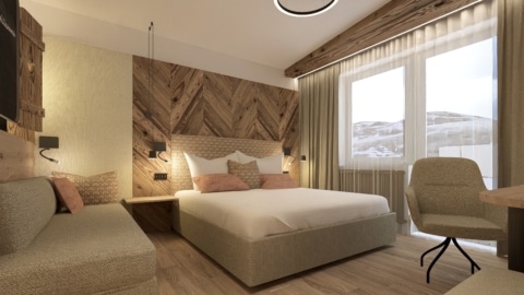 Doppelzimmer Alpin mit Balkon, Schlafcouch und Schreibtisch im Hotel Gamsleiten Obertauern